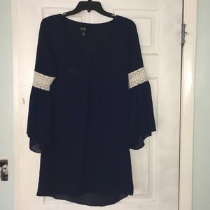 Low cut flowing long sleeved dress
